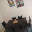 Dining table with 6 leather chairs photo 1