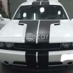 As new white Challenger in very good condition photo 1