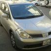 Tida hatchback photo 1