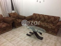 Good condition sofa+ small coffee table for sale in Qatar