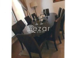 Dining table with 10 chairs for sale in Qatar