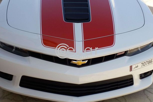 Camaro ss white with orange/red stripes Still under warranty. photo 9