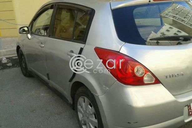 Tida hatchback photo 2