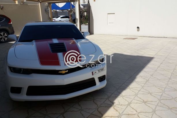 Camaro ss white with orange/red stripes Still under warranty. photo 3