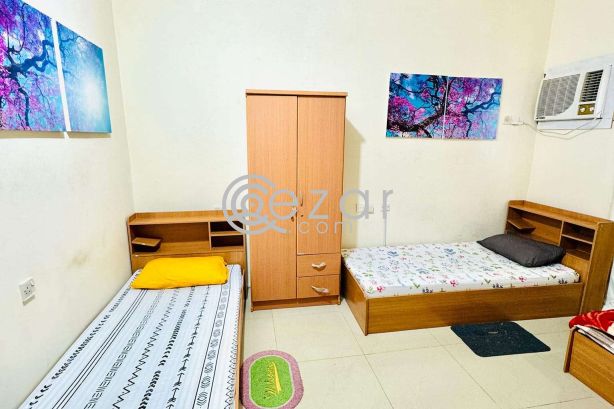 Sharing room bed space near sana signal , bank street , souk waqif , national museum photo 1