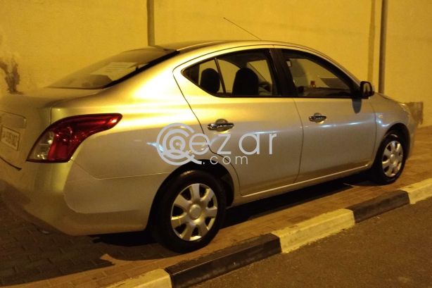 Nissan sunny 2012 (silver) photo 4