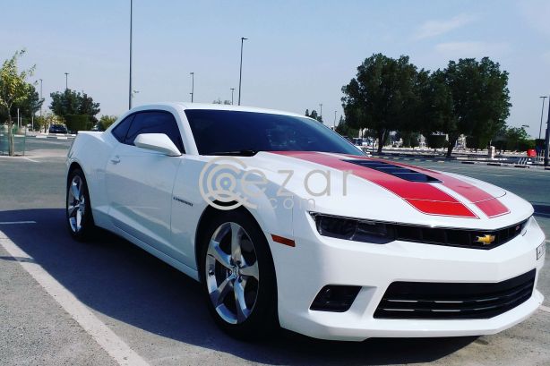 Camaro ss white with orange/red stripes Still under warranty. photo 4