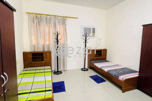 Sharing room bed space near sana signal , bank street , souk waqif , national museum photo 11