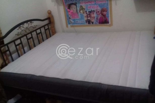 Ikea King size Mattress with bed frame photo 1
